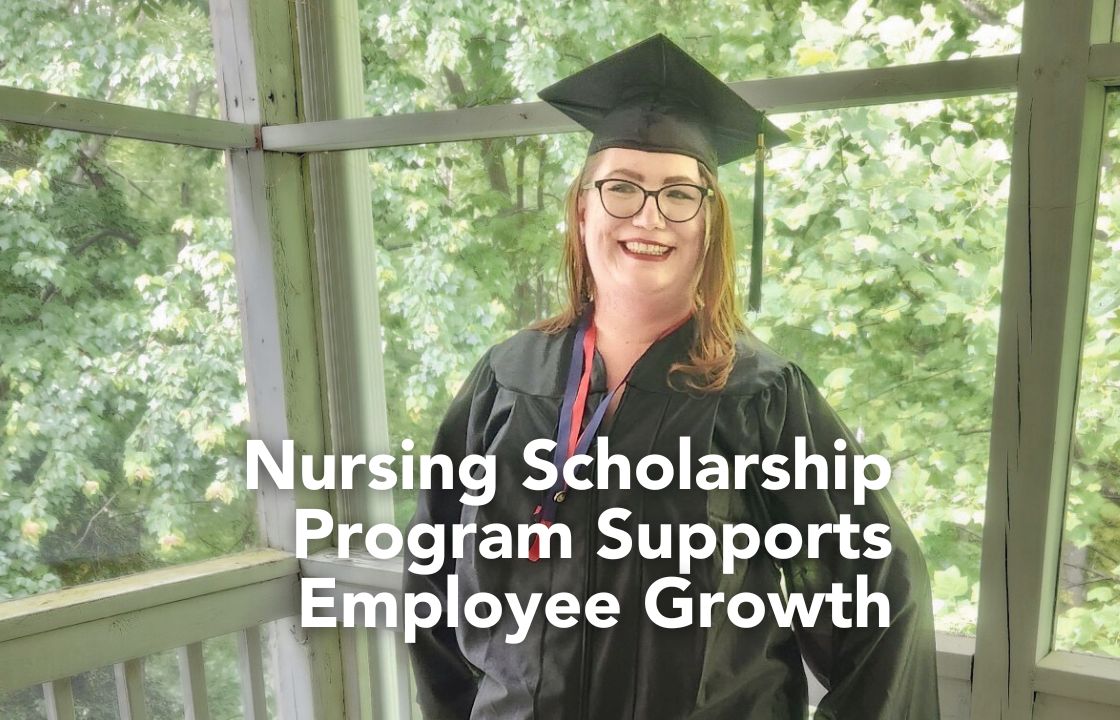 A nursing scholarship recipient poses in her cap and gown.