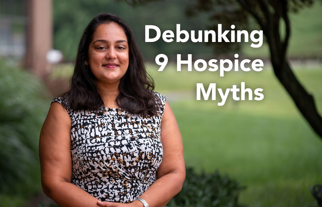 Dr. Simran Mann stands outside near a tree alongside the words "Debunking 9 Hospice Myths"