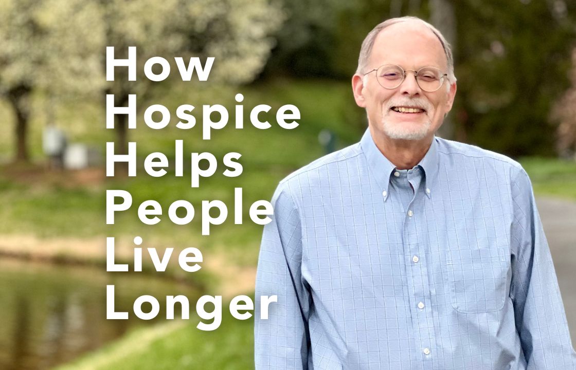 Dr. Will Anderson wears a light blue button up shirt alongside the words "How hospice helps people live longer."