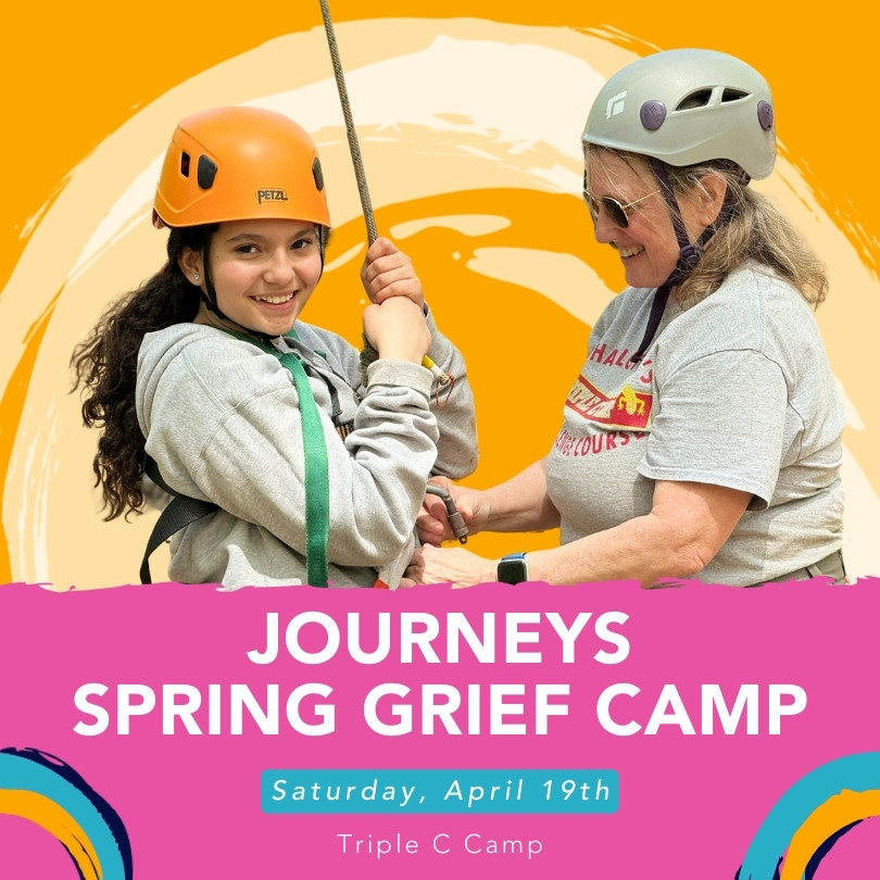 A camper puts on her harness for fun and adventure at a Journeys Spring Grief Camp
